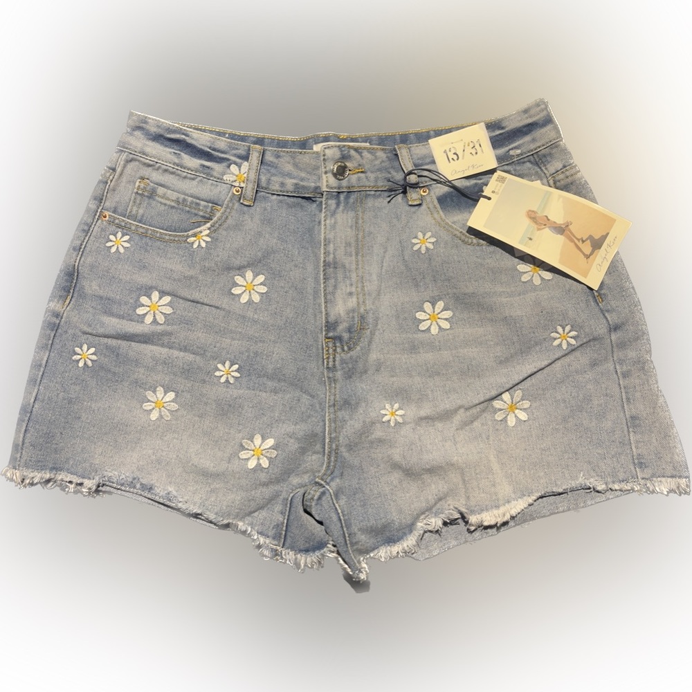 Denim shorts with daisy embroidery.
